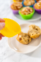 Lemon poppy seed muffins garnished with almond slivers
