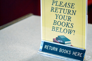 Book return with negative space