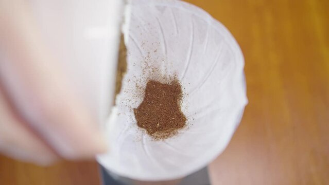 Ground fresh coffee beans for the v60 method. Coffee filter.