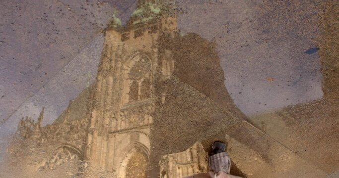 Impulsive Reaction woman may simply succumb impulsive urge inspired beautiful reflection puddle responding immediate inspiration and joy seeing her own reflection.