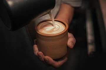 Crafting a Perfect Cup of Coffee with Latte Art, clay cup