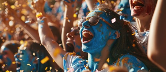 Sports stadium event: Fans cheer for the blue soccer team, celebrate goal and championship victory. Friends with painted faces have emotional fun. - obrazy, fototapety, plakaty