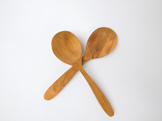 Wooden tablespoon isolated on white background