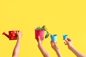 People with gardening tools and plants on yellow background