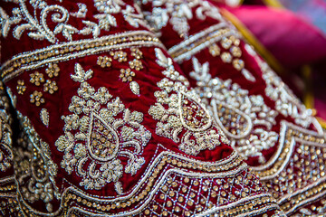 Indian bride's wedding outfit fabric, pattern and texture close up