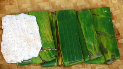 Tempe mendoan.Thin and wide shape of tempeh. Made from fermented soybeans and wrapped in banana leaves.