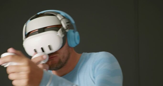 Close-up.Man using Virtual Reality 360 headset, fitness boxing fighting workout.