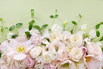 Delicate blooming festive begonia flowers and pink summer roses, blossoming rose flower soft pastel background, bouquet floral card, selective focus