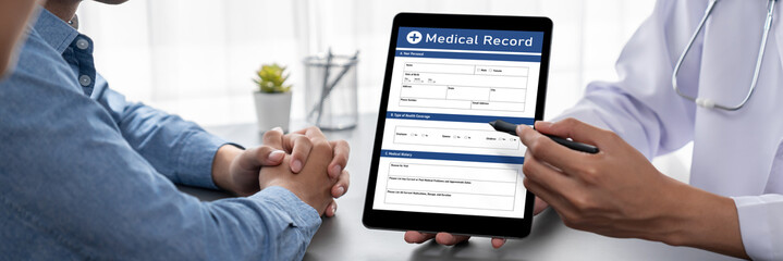Doctor show medical diagnosis report on tablet and providing compassionate healthcare consultation...