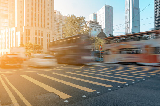 Busy city street people on zebra crossing at Hong Kong
