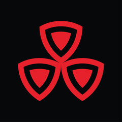 abstract shield monogram design rotated ninety degrees. red on a black background.