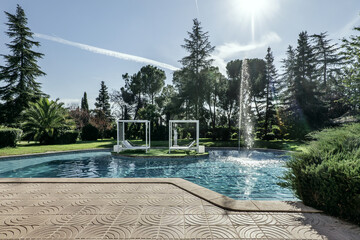 A large pool with an island in the middle