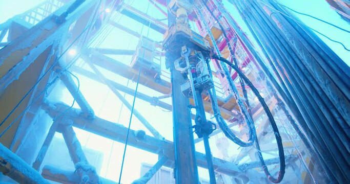 Oil drilling rig in the frost. Panoramic view inside