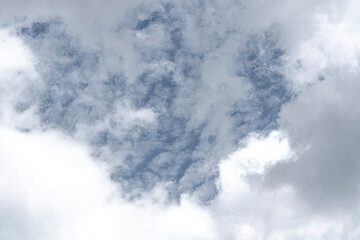 White clouds blue sky background.