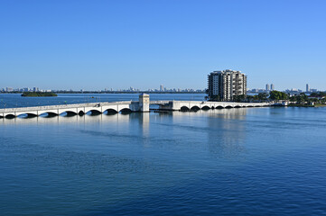 Fototapeta na wymiar The Venetian Causeway between Miami and Miami Beach, Florida and Intracoastal Waterway on a clear cloudless December morning.
