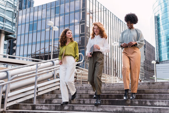 Young, urban group of bussinespeople walking