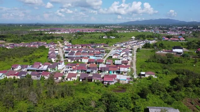Aerial view of subsidized housing (KPR) on a wide and green land
