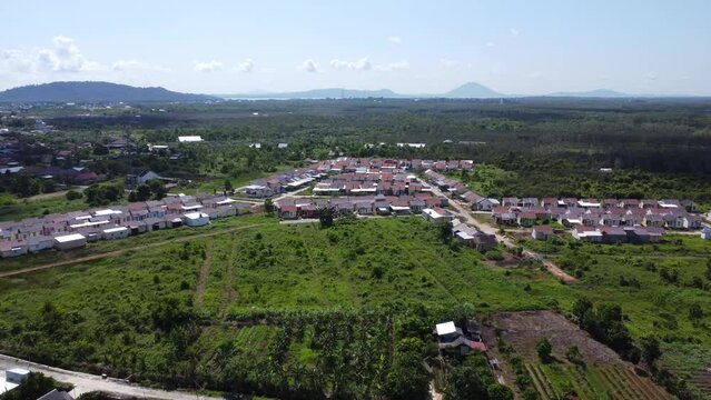 Aerial view of subsidized housing (KPR) on a wide and green land