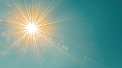 Sunburst with lens flare on a blue sky background - obrazy, fototapety, plakaty