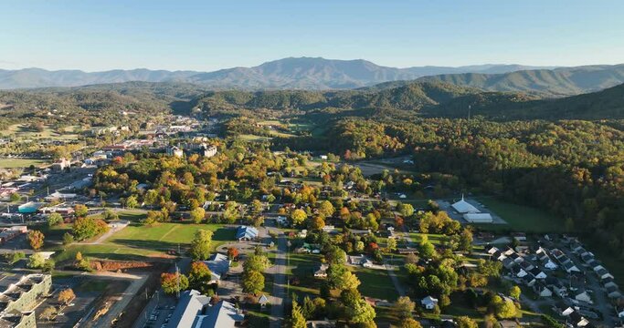 Aerial above Pigeon Forge with Great Smoky Mountains in the background, Tennessee