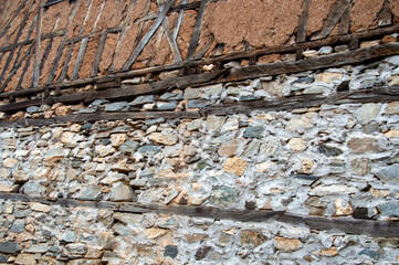 collapsed adobe and brick wall