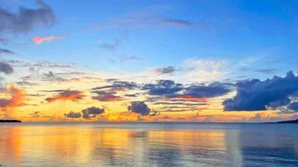 Fotobehang Goud Geel 沖縄県 名護 道の駅許田からの眺め 夕暮れ時の海  © creamfeeder