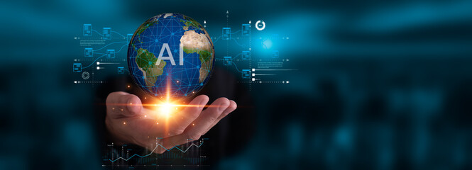 Businessman holds globe with light among high-tech icons and growth graphs and data analysis. Futuristic concepts for global business success. Elements of this image furnished by NASA.