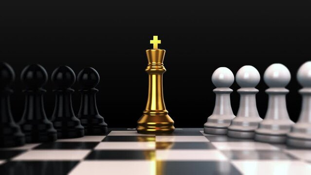 Black and white pawns with gold king on chess board