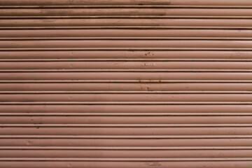 Peach Fuzz horizontal entry store metal curtain texture surface door steel background industrial...