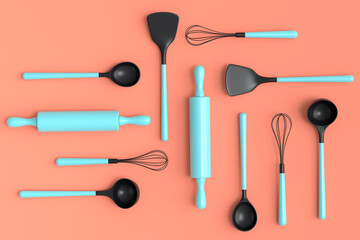 Wooden kitchen utensils, tools and equipment on orange background.