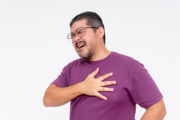 A middle aged man having trouble breathing and wheezing. Having an asthma attack. Isolated on a white background.