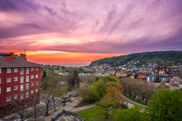 Sunset in Donostia San Sebastian from a high neighborhood and the sea in the background. Basque...