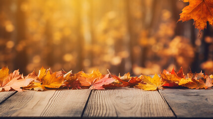 Naklejka na ściany i meble wooden table with beautiful orange leaves autumn background
