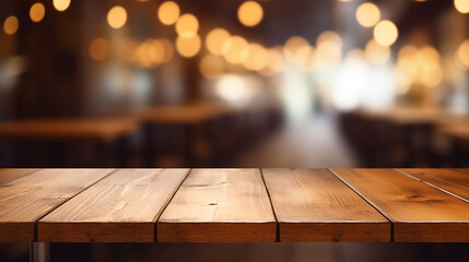 Empty wooden table top with blurred coffee shop - obrazy, fototapety, plakaty