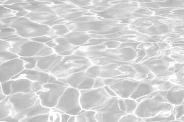 Transparent white water clear surface texture with ripples and splashes. Top view of water waves...