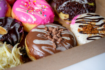 donuts with various flavors look very delicious