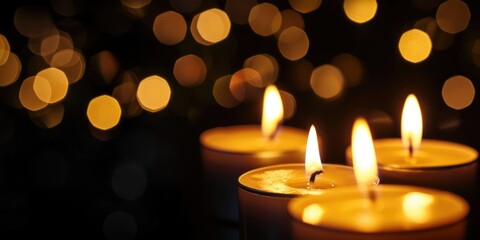 candles in the dark with bokeh blurred background