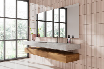 Hotel bathroom interior with sink and vanity, accessories and panoramic window