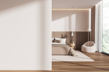 White and beige bedroom interior with armchair and blank wall