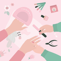 Manicurist uses nailfile and nail polish for manicure procedure. Caucasian woman at manicure salon. Beauty salon, manicure tools on table. Nails and beauty. Gel laque. Gel polish.