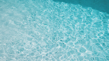 Fototapeta na wymiar Blue Oasis: Textured Water in the Refreshing Swimming Pool