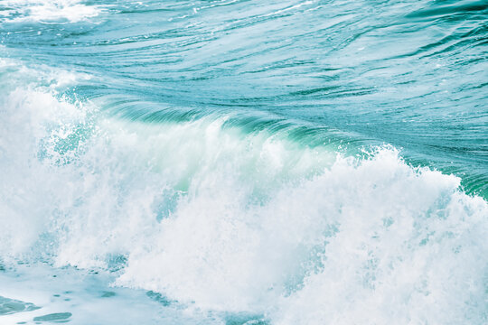 Wave splashing close-up. Crystal clear sea water, in the ocean in San Francisco Bay, blue water, pastel colors. © Volodymyr