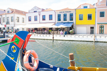 The central canal of Aveiro in Portugal - 703755326