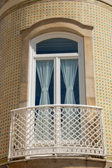 decorated window of an historic building at  Aveiro - 703755360