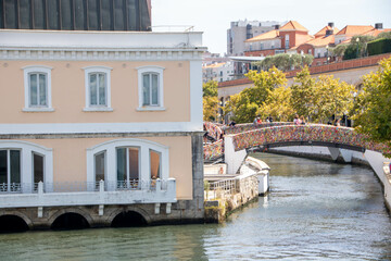 The central canal of Aveiro in Portugal - 703755371
