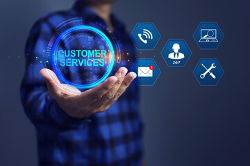 Customer service concept with businessman holding a customer services information icon or after sale support such as repair, newsletter e-mail, question and answer, on site delivery 24 hour in 7 day