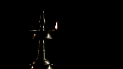 Indian oil lamp isolated in Black Background, 4k Video