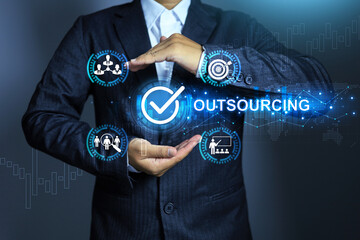 Outsourcing manpower concept with businessman holding checkmark to approved hiring outsource...