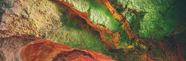 Texture of cave Benagil. Nature background. Coastal rocky seascape, Algarve region in Atlantic ocean, Portugal, Europe Horizontal banner