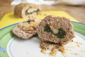 piece of the spinach meatloaf cut half